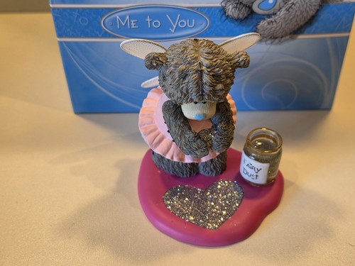 You bear figurine - to,